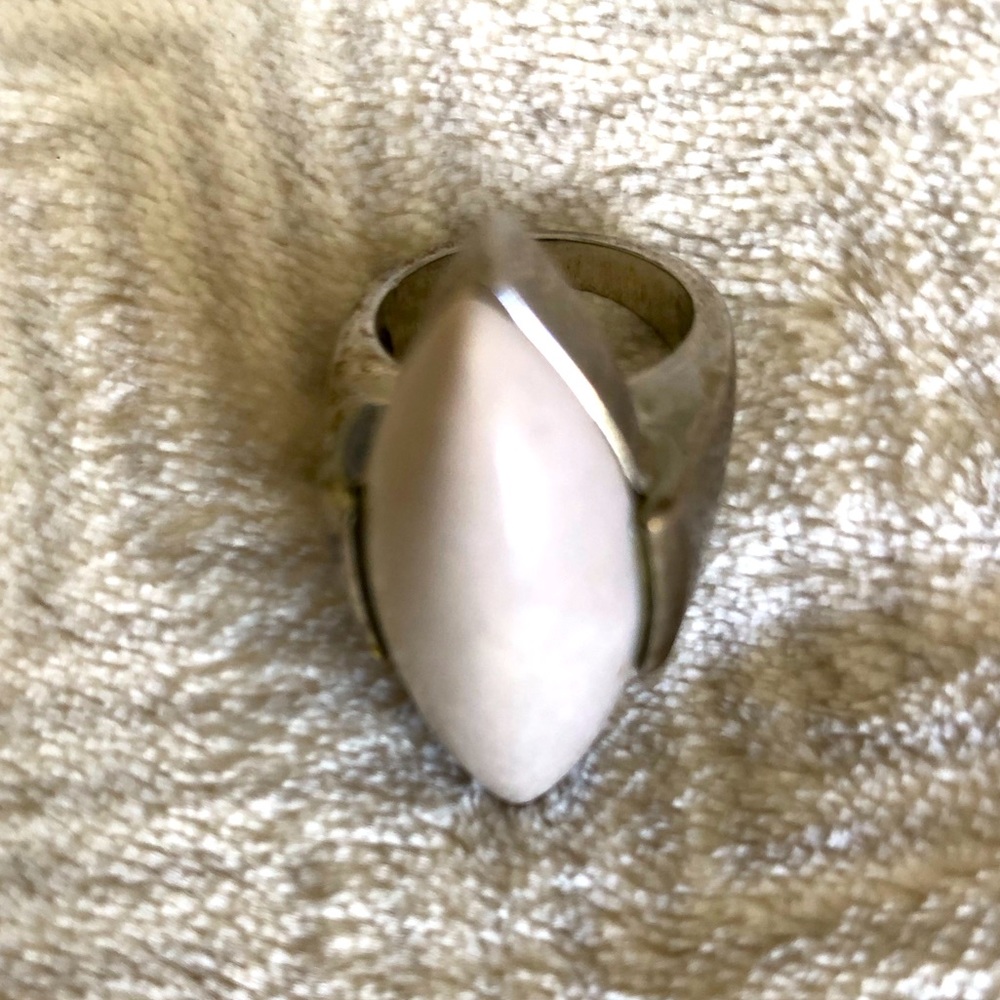 Beautiful ring with white oval large shiny white stone , silver coloured band, 6